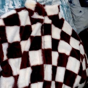 This is a fur checker sweater very good condition very pretty
